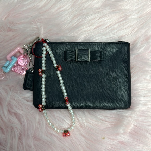 Elegant Black Women's Coach wristlet with bow coquette - Picture 2 of 6